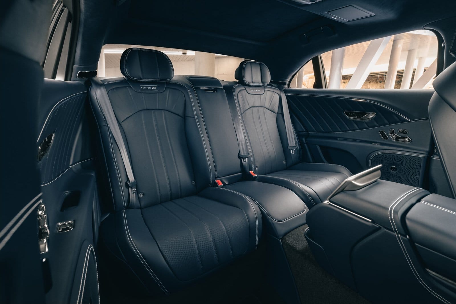 Bentley Flying Spur Plug-in Hybrid electric vehicle rear seats with dark leather and contrast stitching