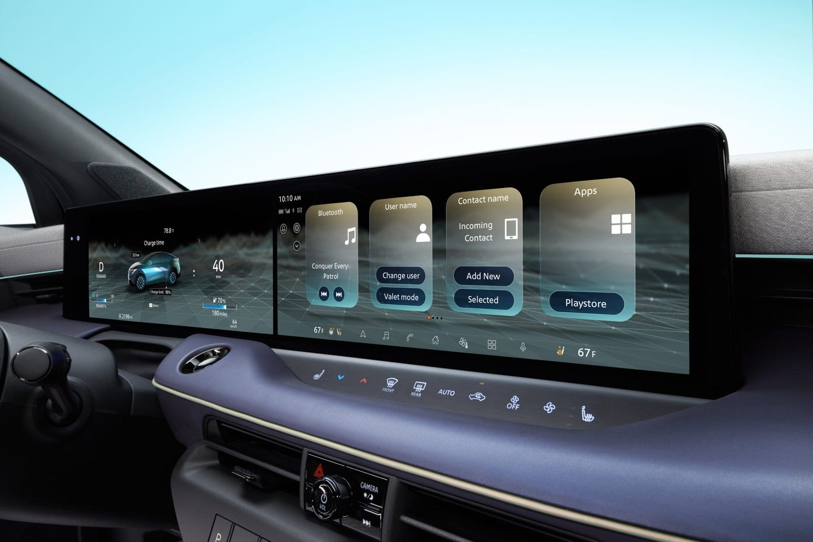 Close-up of the Nissan Leaf electric vehicle’s wide digital display showing charge status, climate controls, and apps