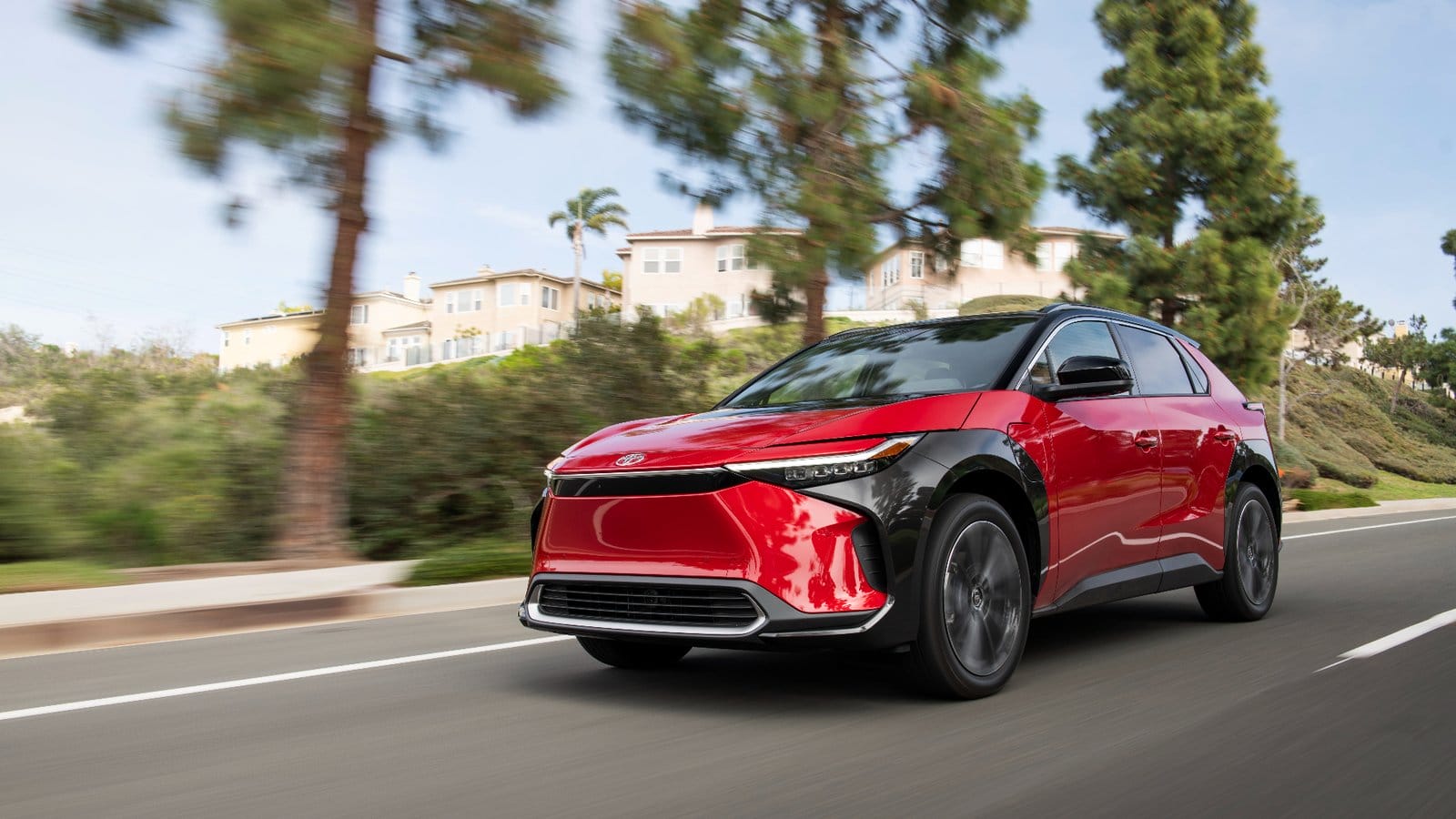 2023 toyota bz4x red driving