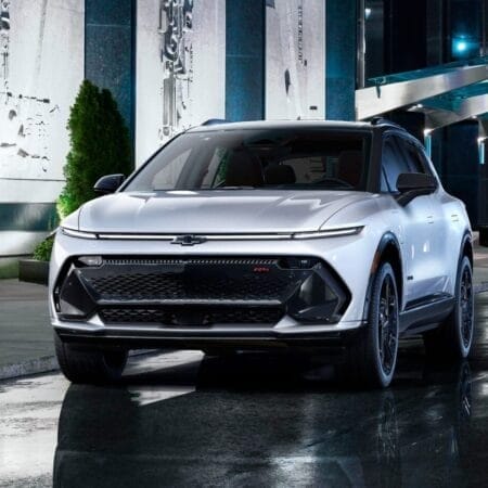 Chic White Chevrolet Equinox EV in Urban Night Scene