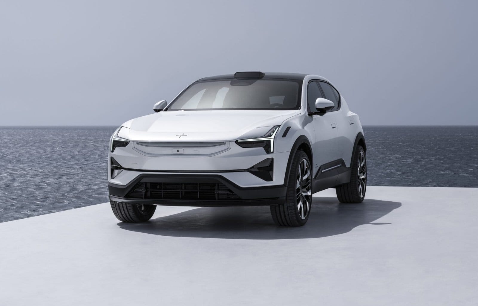 Pristine White Polestar 3 Electric Vehicle Seaside View