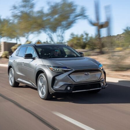 Sleek Silver Subaru Solterra Electric Vehicle in Motion