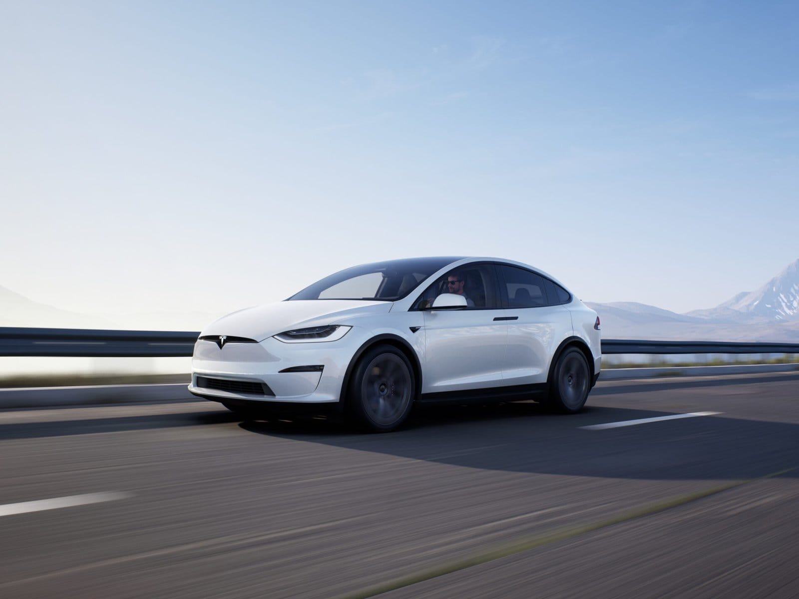 tesla model x electric vehicle highway drive
