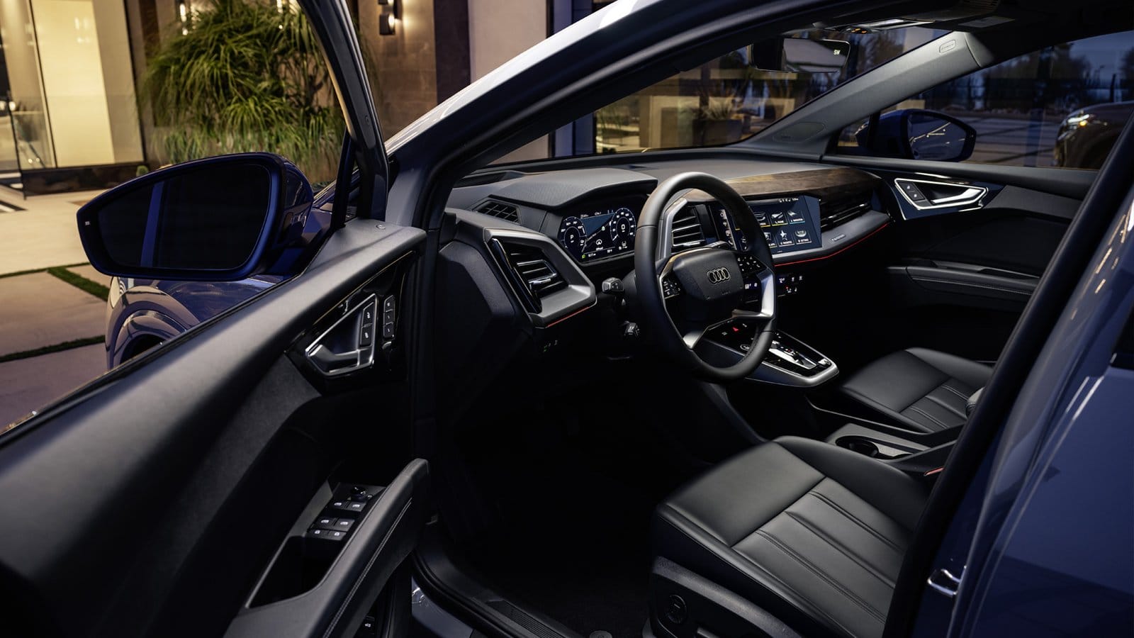 audi q4 etron electric vehicle interior evening