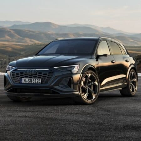 audi q8 e tron electric vehicle mountain backdrop