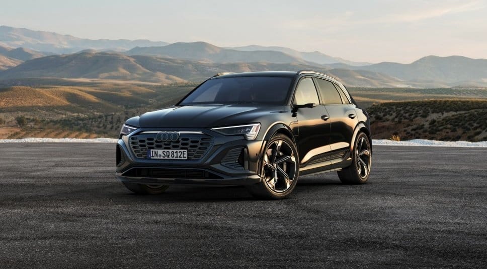 audi q8 e tron electric vehicle mountain backdrop
