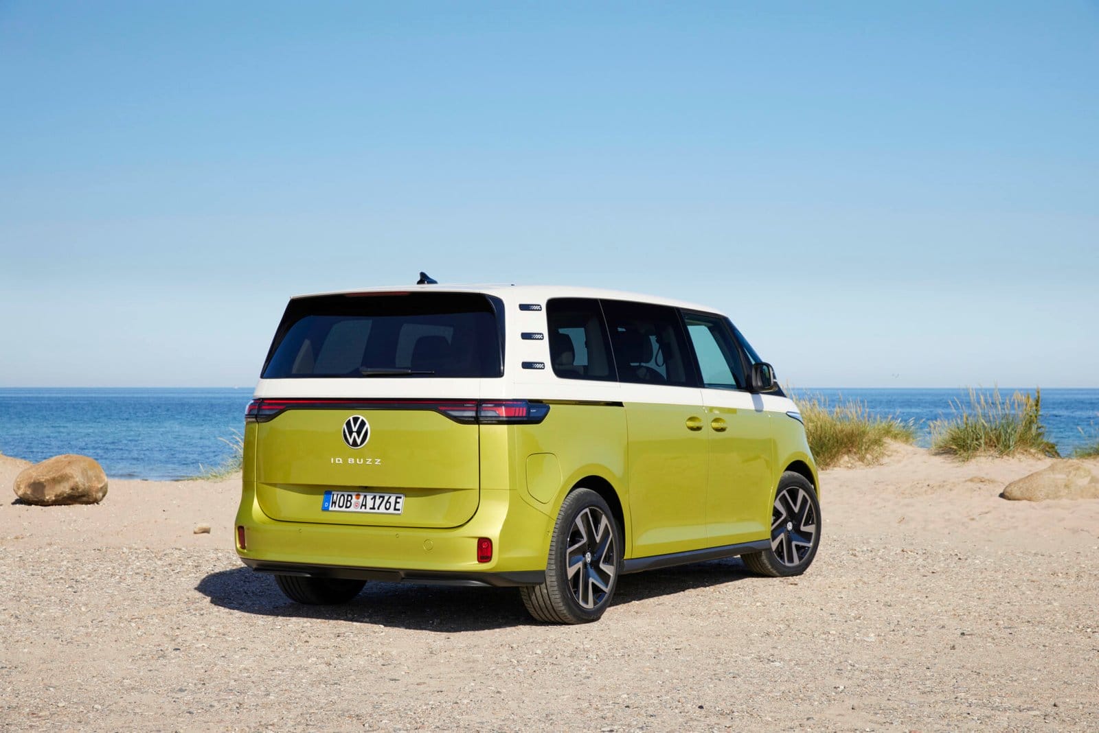 volkswagen id buzz electric vehicle rear beach