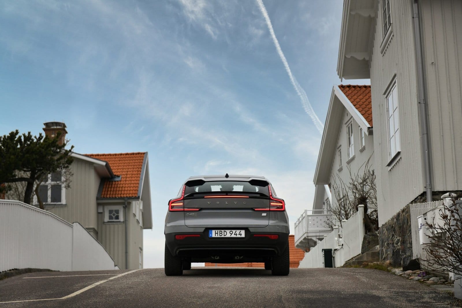volvo c40 recharge electric vehicle suburban street