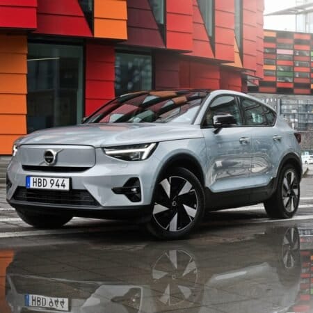 volvo c40 recharge electric vehicle urban reflection