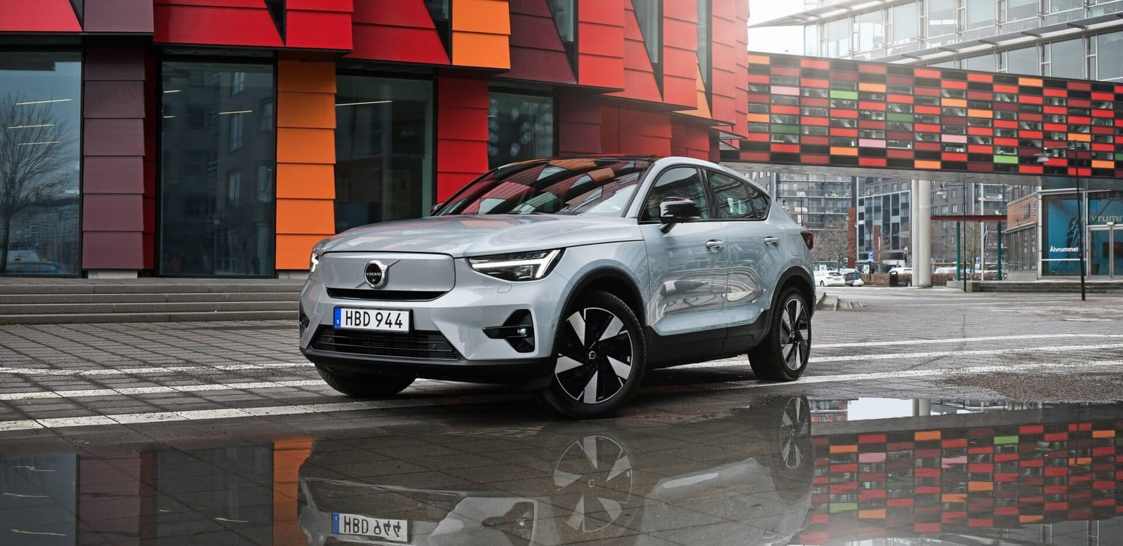 volvo c40 recharge electric vehicle urban reflection