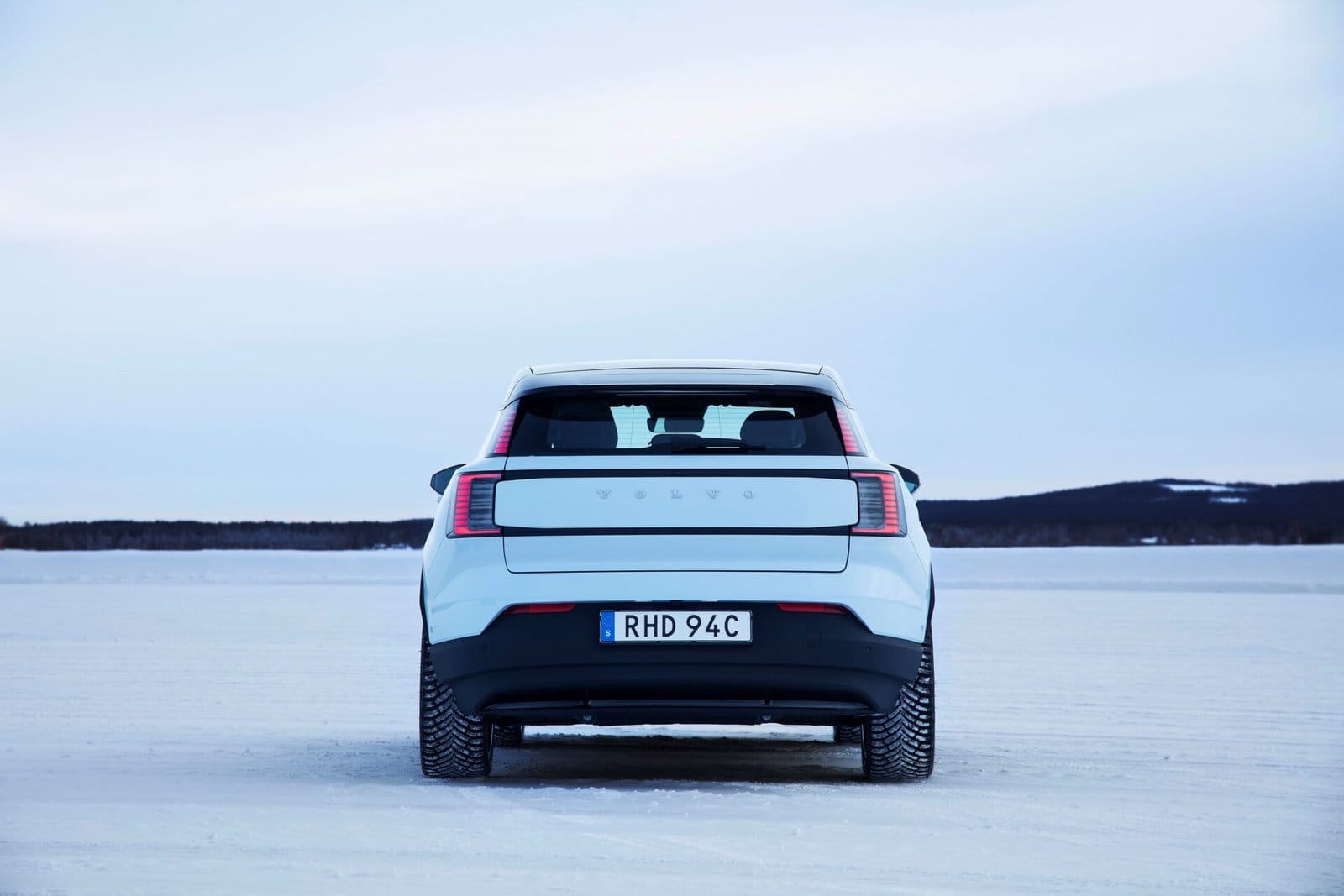 volvo ex30 electric vehicle rear view snow