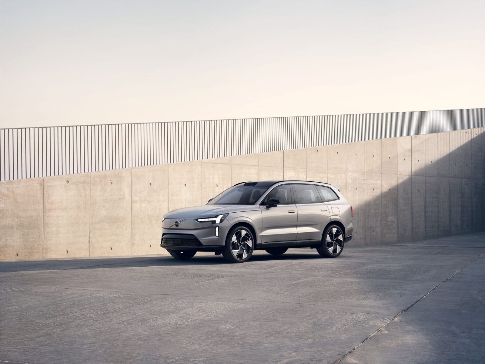 volvo ex90 electric vehicle concrete background