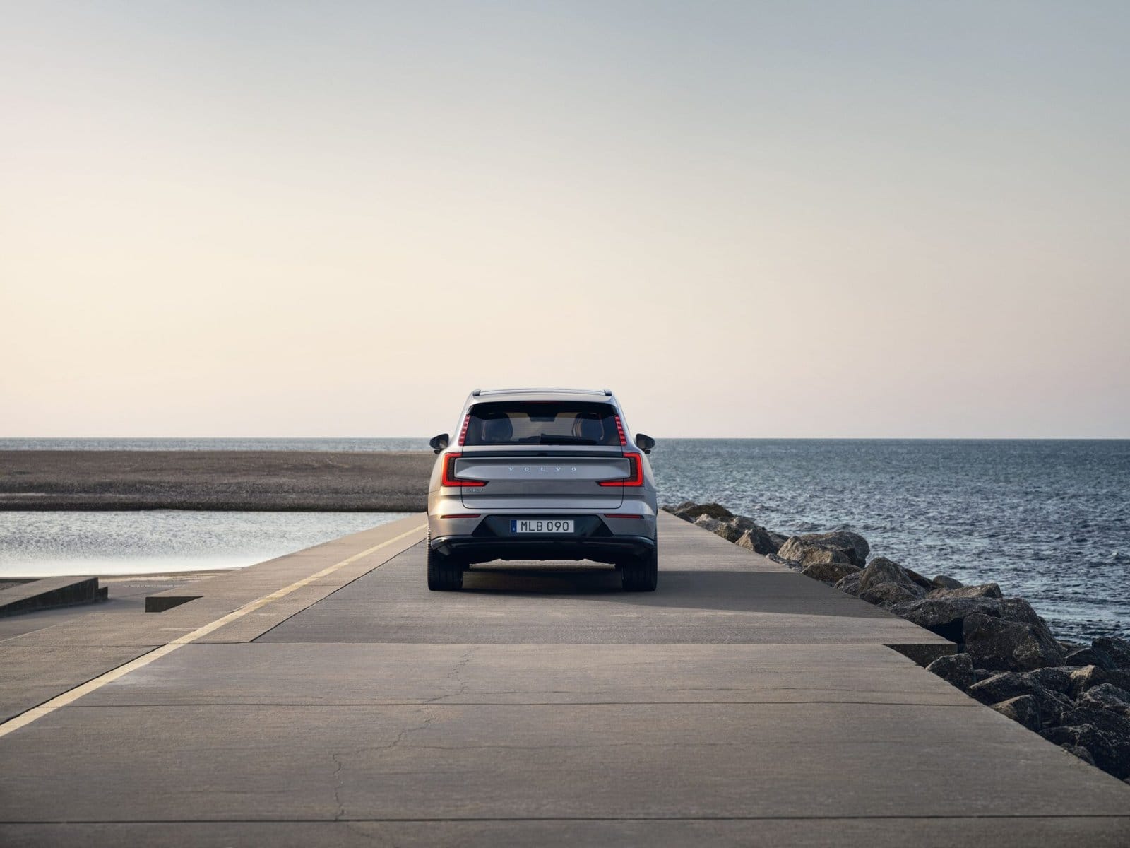 volvo ex90 electric vehicle seaside