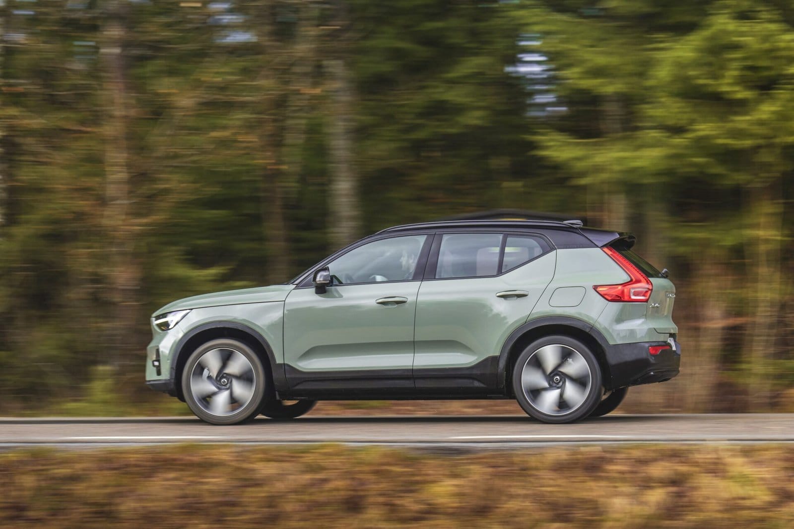 volvo xc40 recharge electric vehicle forest road