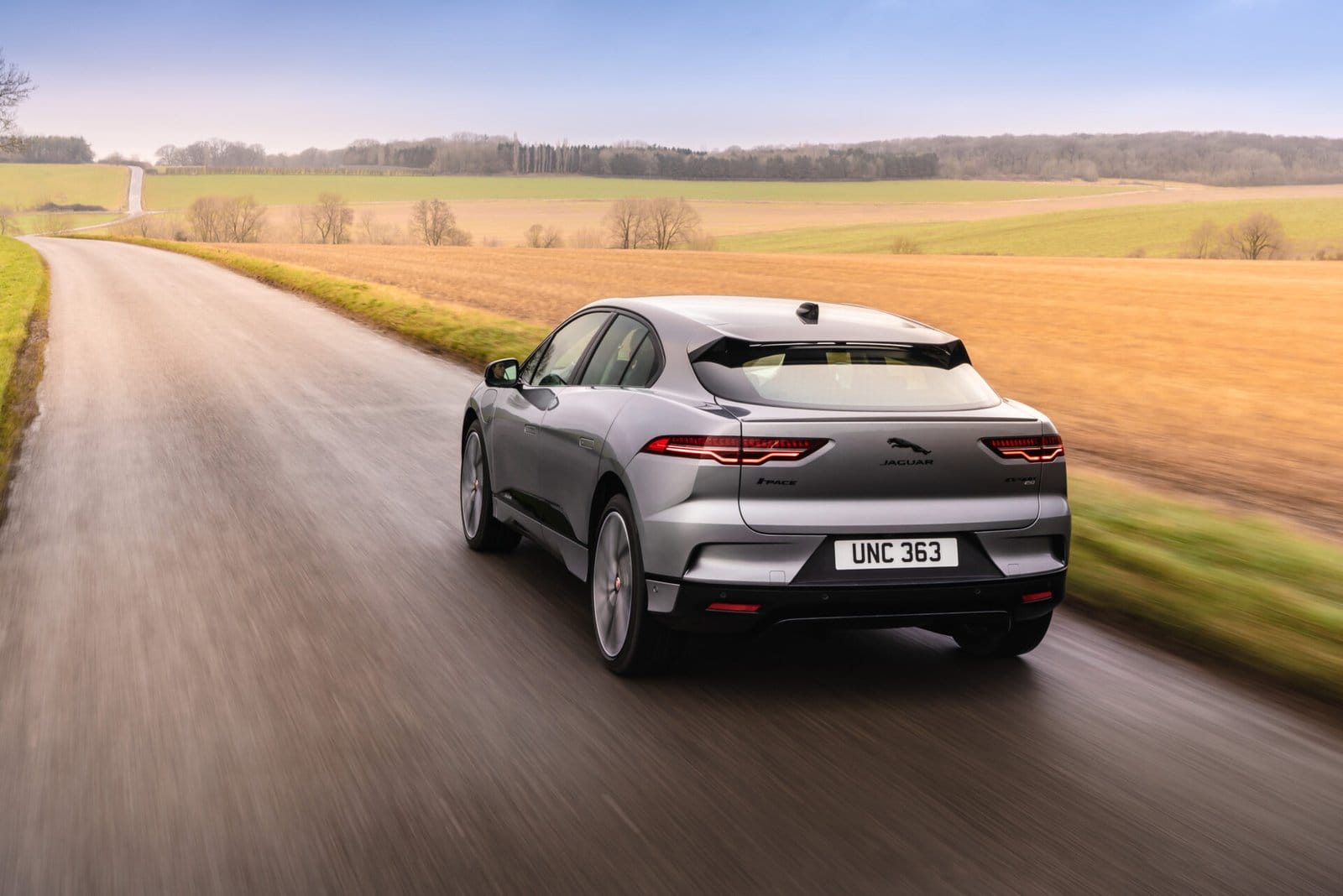 jaguar i pace rear driving country road