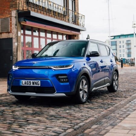 kia soul ev electric vehicle cobblestone street