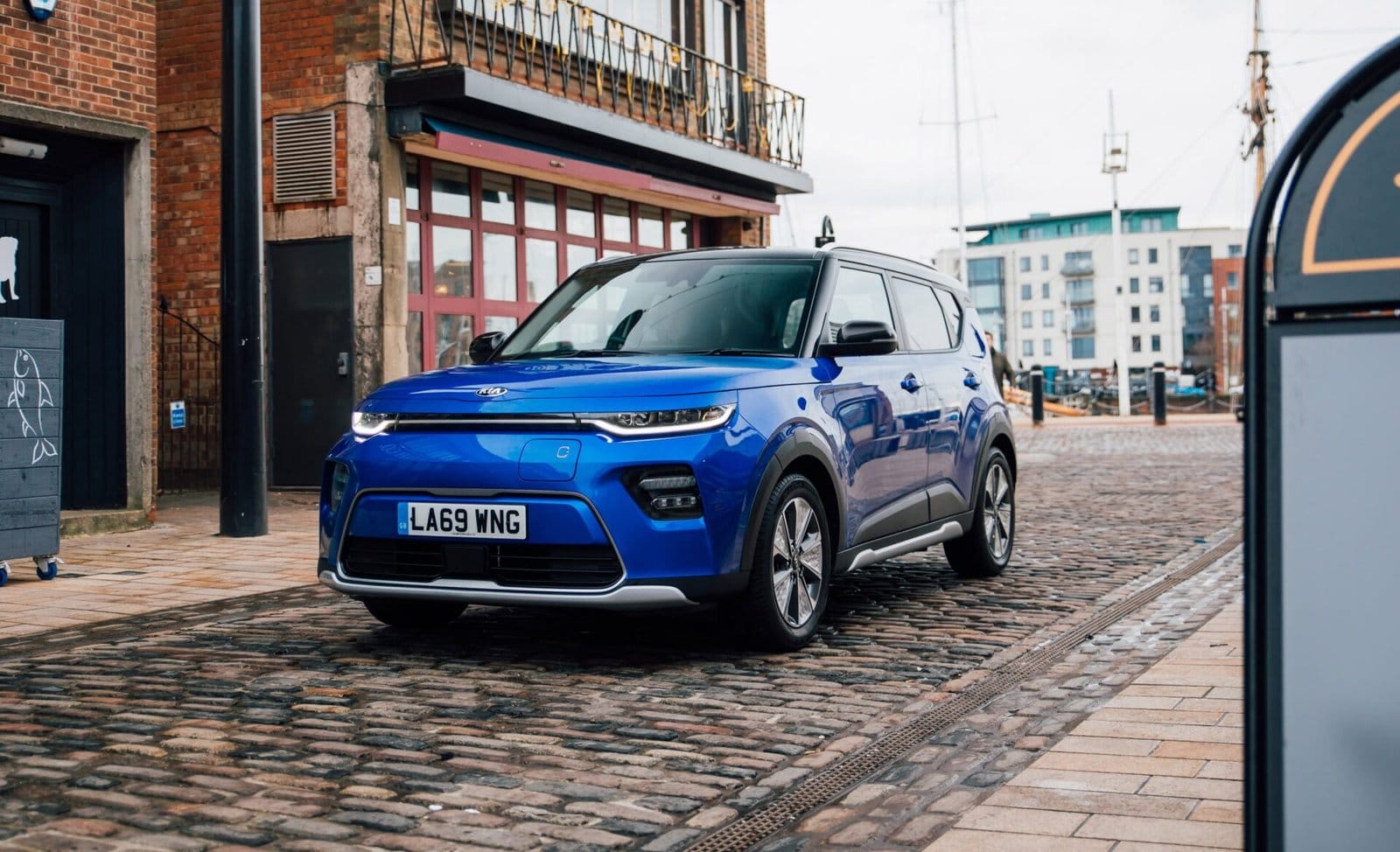kia soul ev electric vehicle cobblestone street