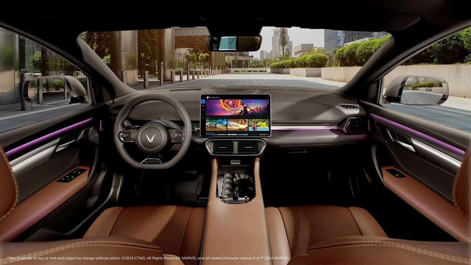 Interior view of the 2024 Vinfast VF8 electric vehicle showing dashboard, brown seats, and Sony RIDEVU display screen