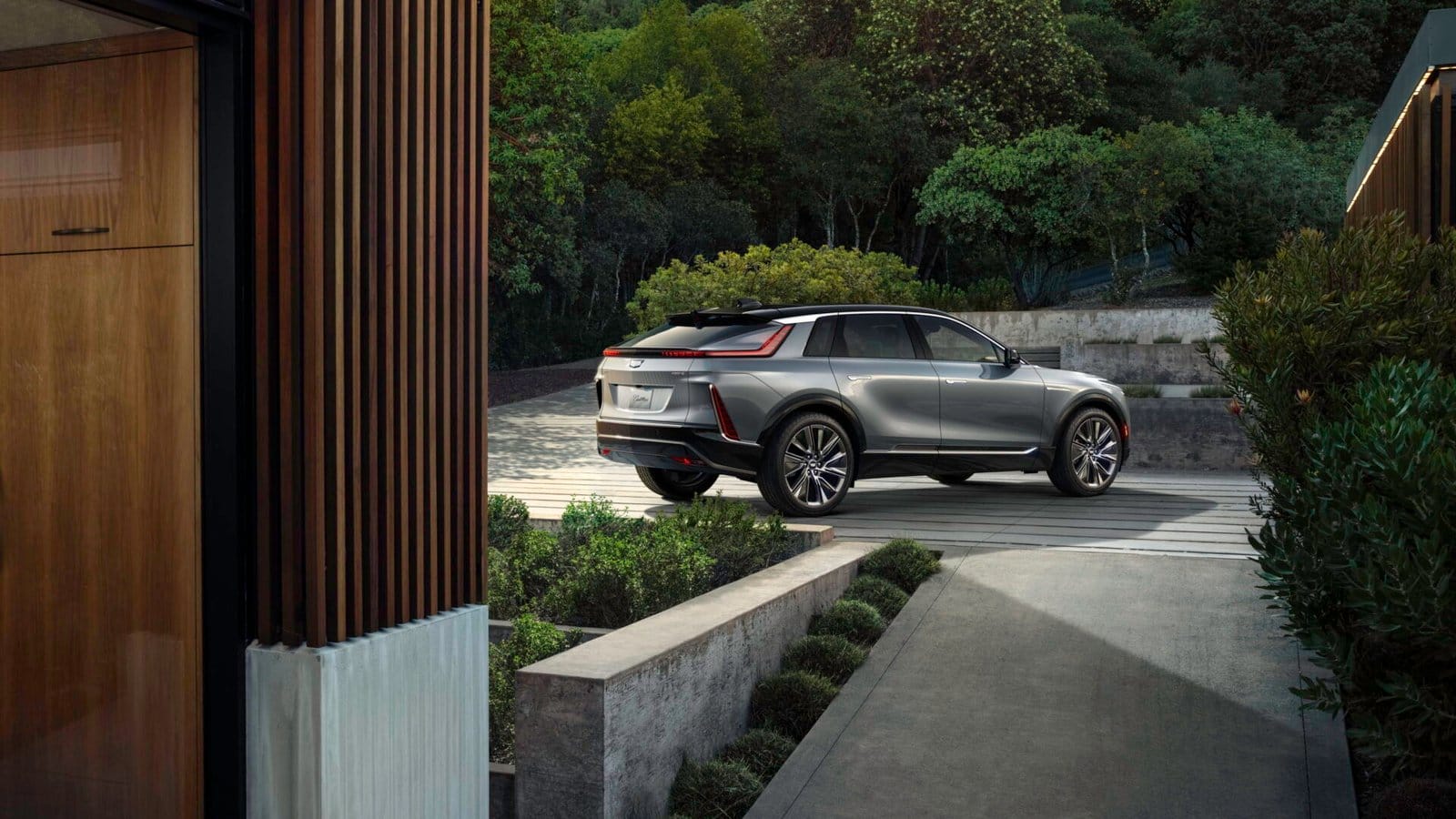 cadillac lyriq electric vehicle backyard nature