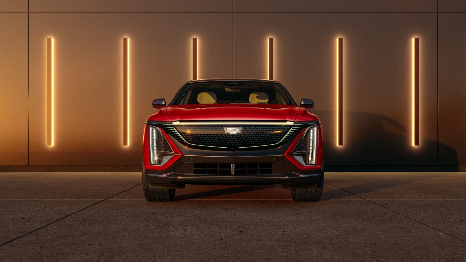 cadillac lyriq electric vehicle front view neon lights