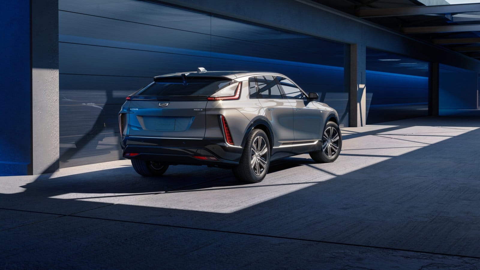 cadillac lyriq electric vehicle modern garage lighting