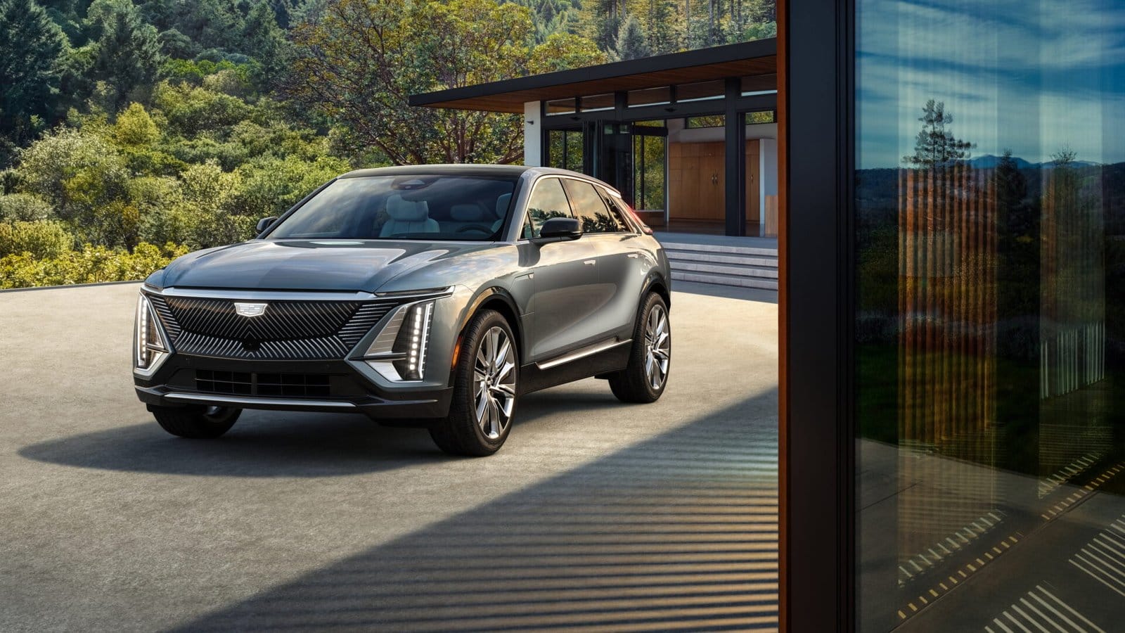 cadillac lyriq electric vehicle modern home