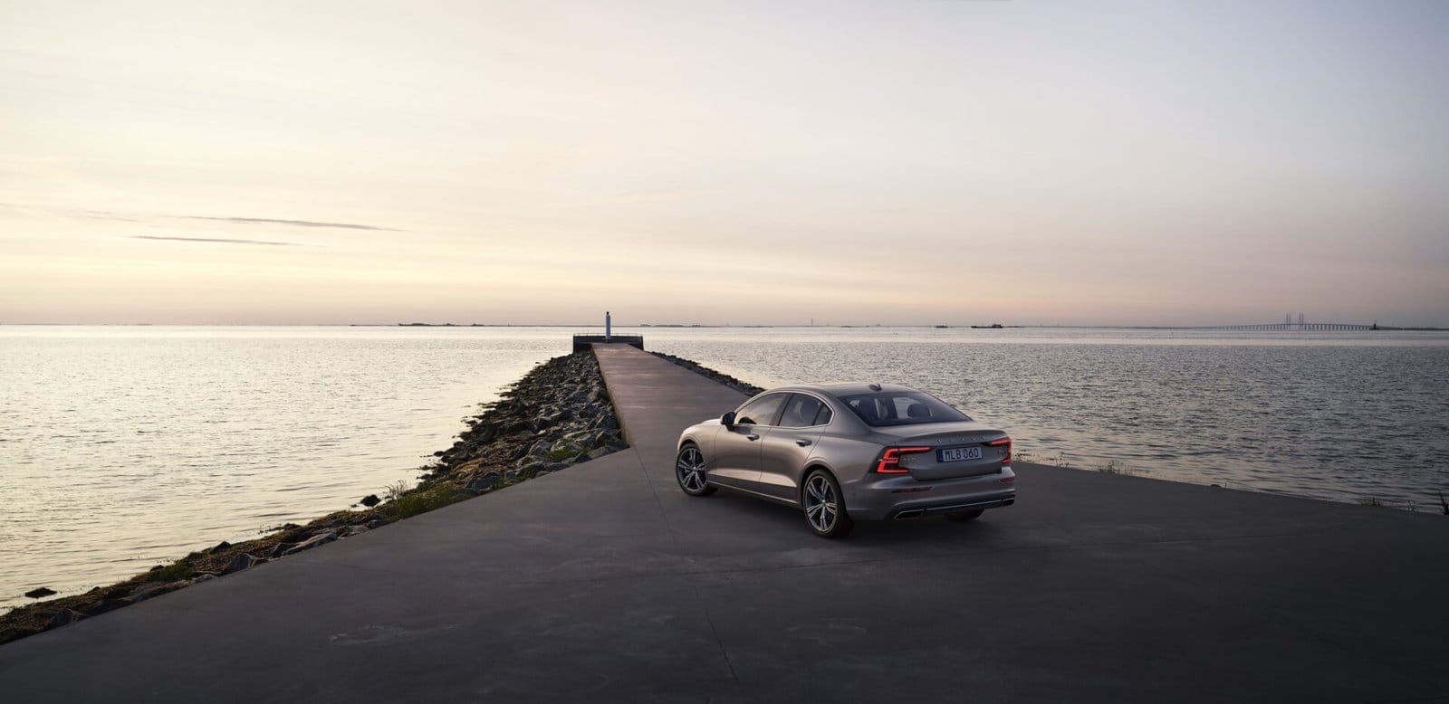 volvo s60 recharge electric vehicle seaside pier sunset