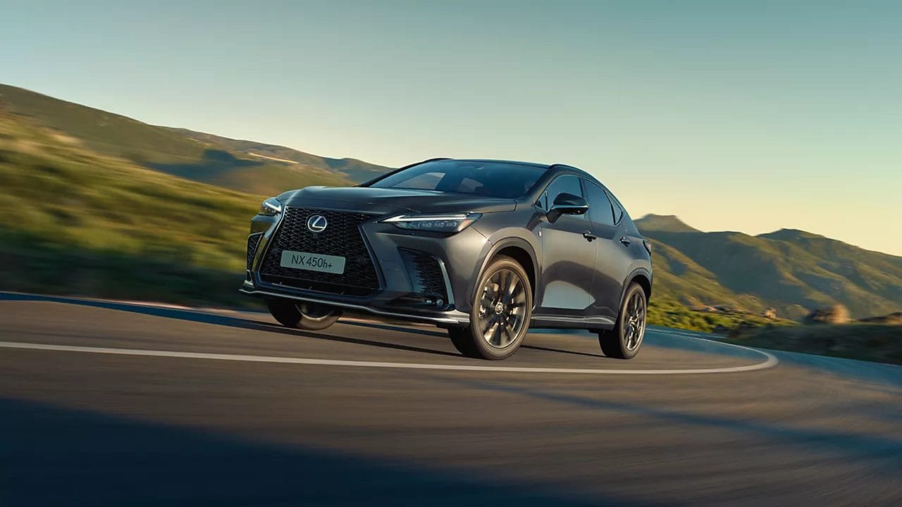 lexus nx 450h plus electric vehicle on scenic road