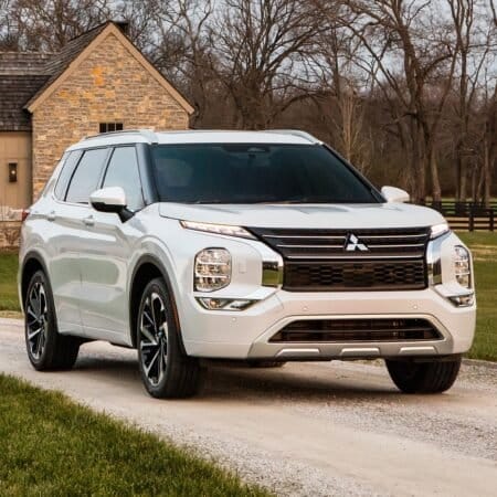 mitsubishi outlander phev electric vehicle country home driveway.