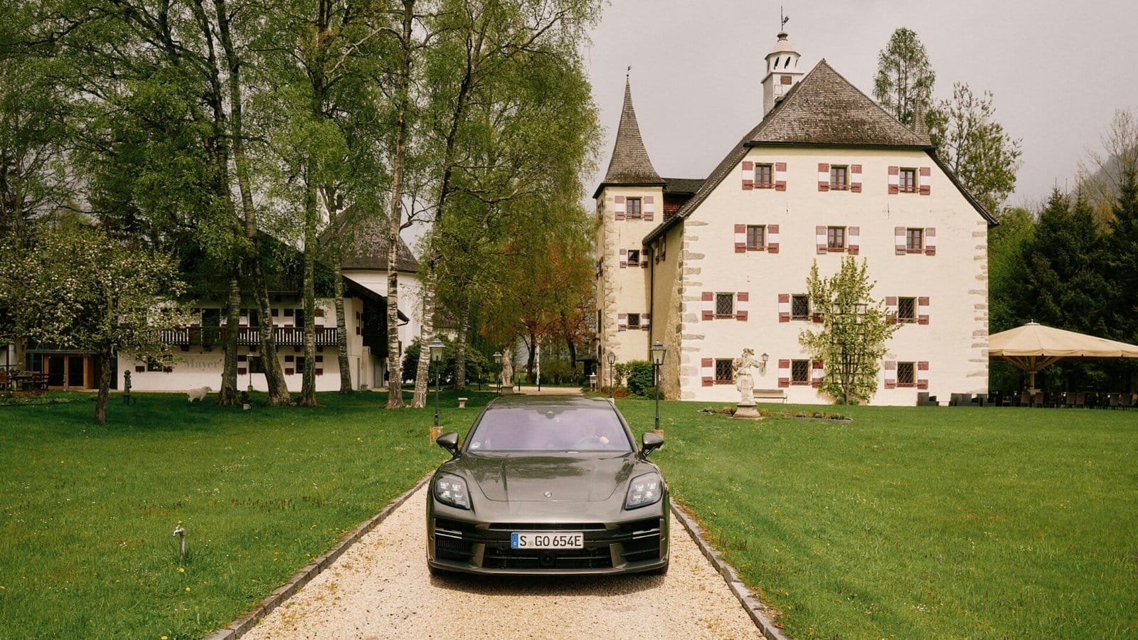 porsche panamera e hybrid electric vehicle castle driveway