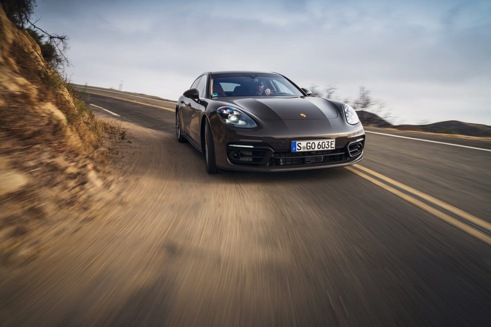 porsche panamera e hybrid electric vehicle winding road