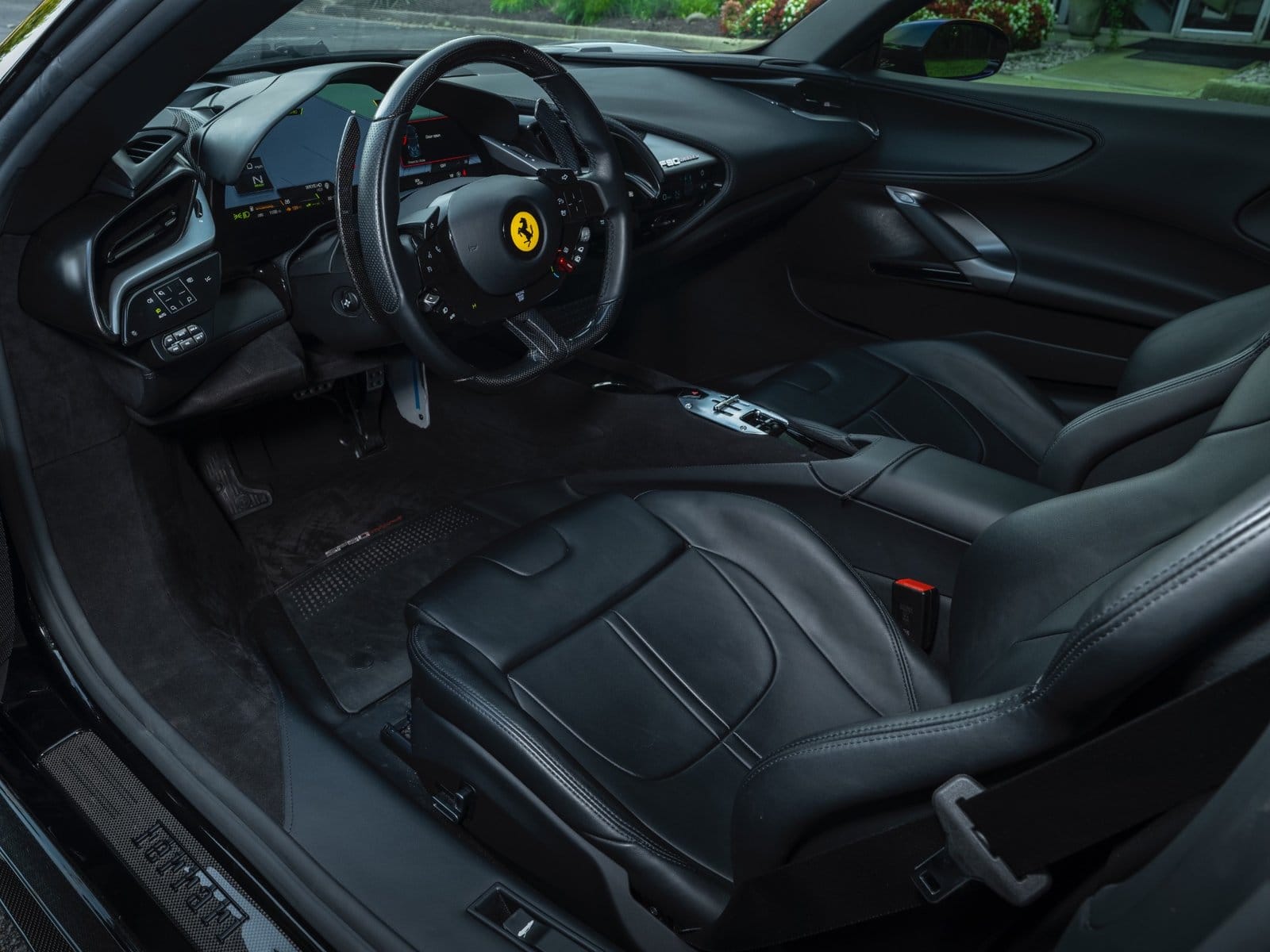 ferrari sf90 stradale electric vehicle black interior
