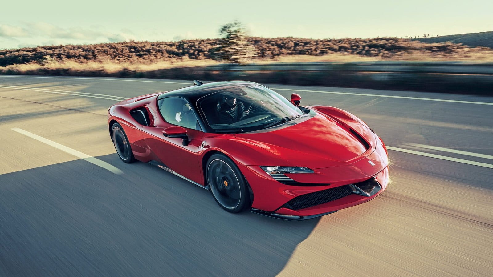 ferrari sf90 stradale electric vehicle driving road