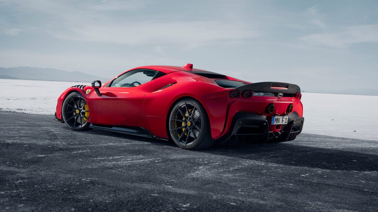ferrari sf90 stradale electric vehicle rear desert view