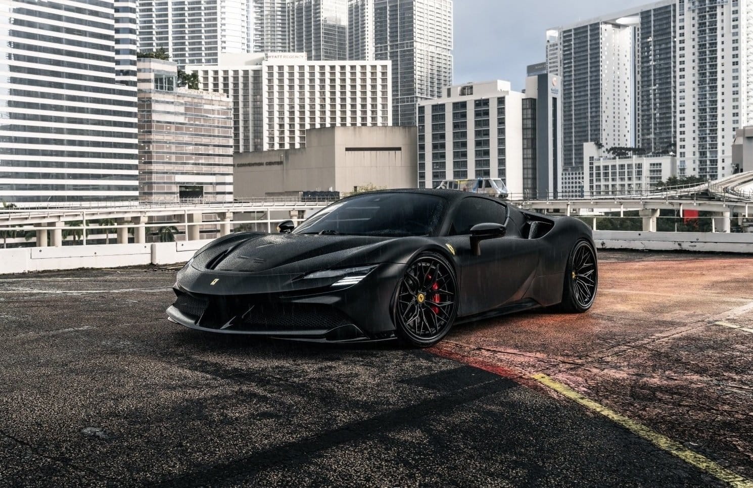 ferrari sf90 stradale electric vehicle skyscraper view