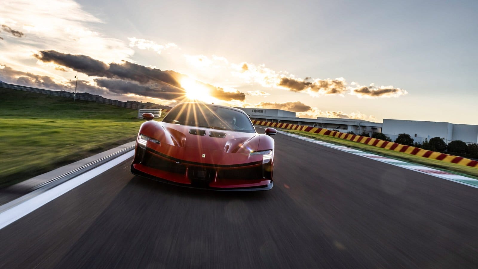 ferrari sf90 stradale electric vehicle sunset track