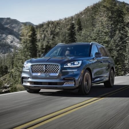 lincoln aviator grand touring electric vehicle mountain road