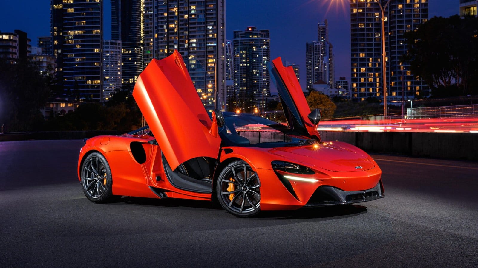 mclaren artura electric vehicle city night