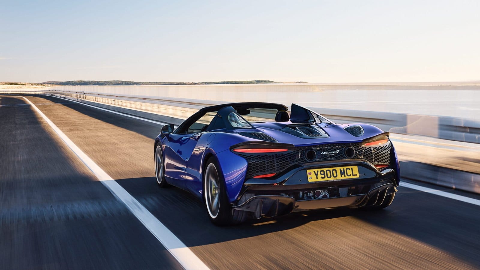 mclaren artura electric vehicle rear coastal drive.