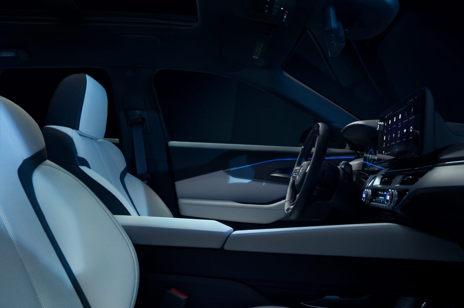 A detailed interior view of the Acura ZDX electric vehicle showcasing premium seats, a digital dashboard, and ambient lighting in a sleek cabin design.