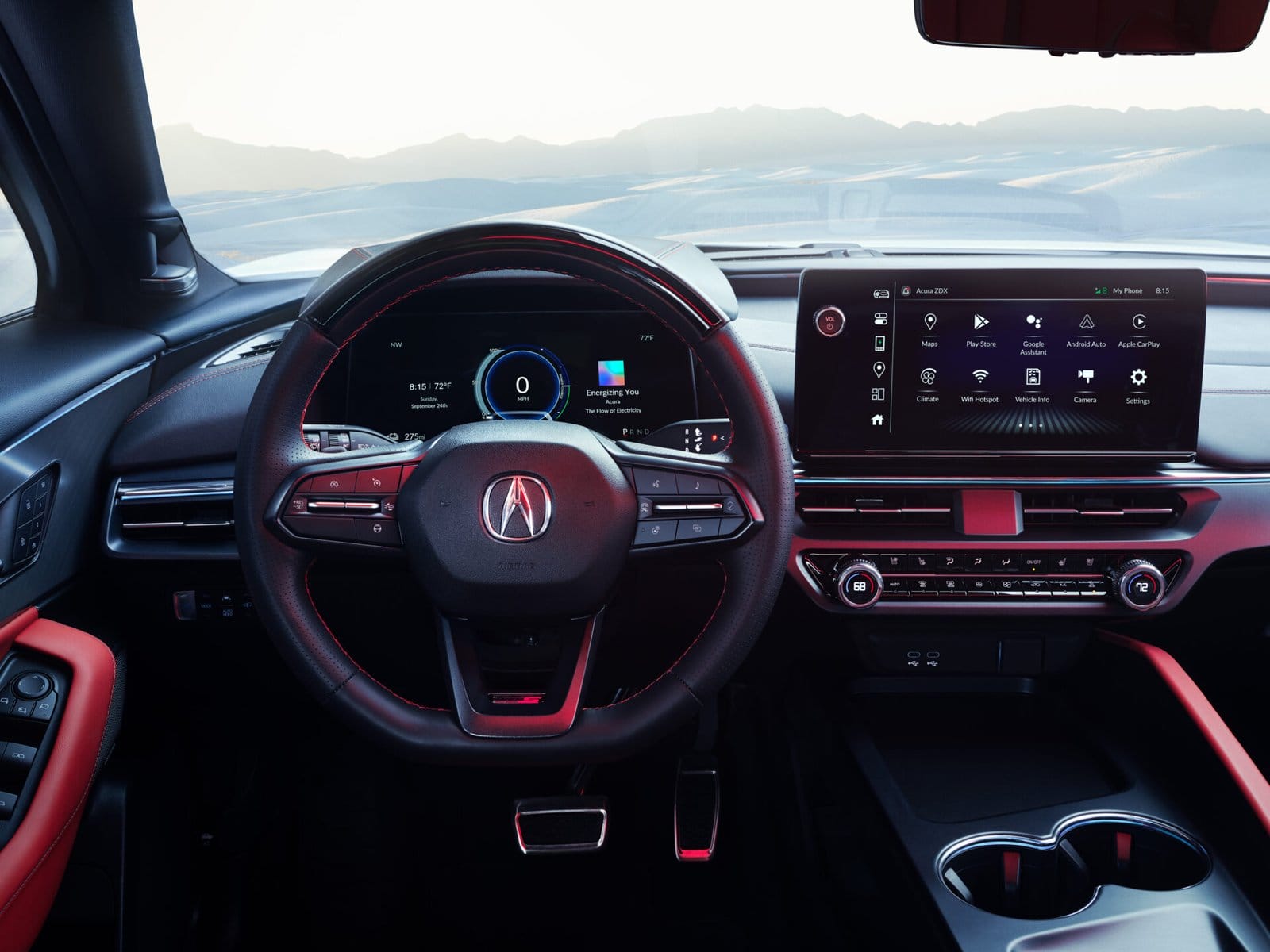 The Acura ZDX electric vehicle’s steering wheel, digital driver display, and large infotainment screen, showcasing advanced controls and a sleek interior design.