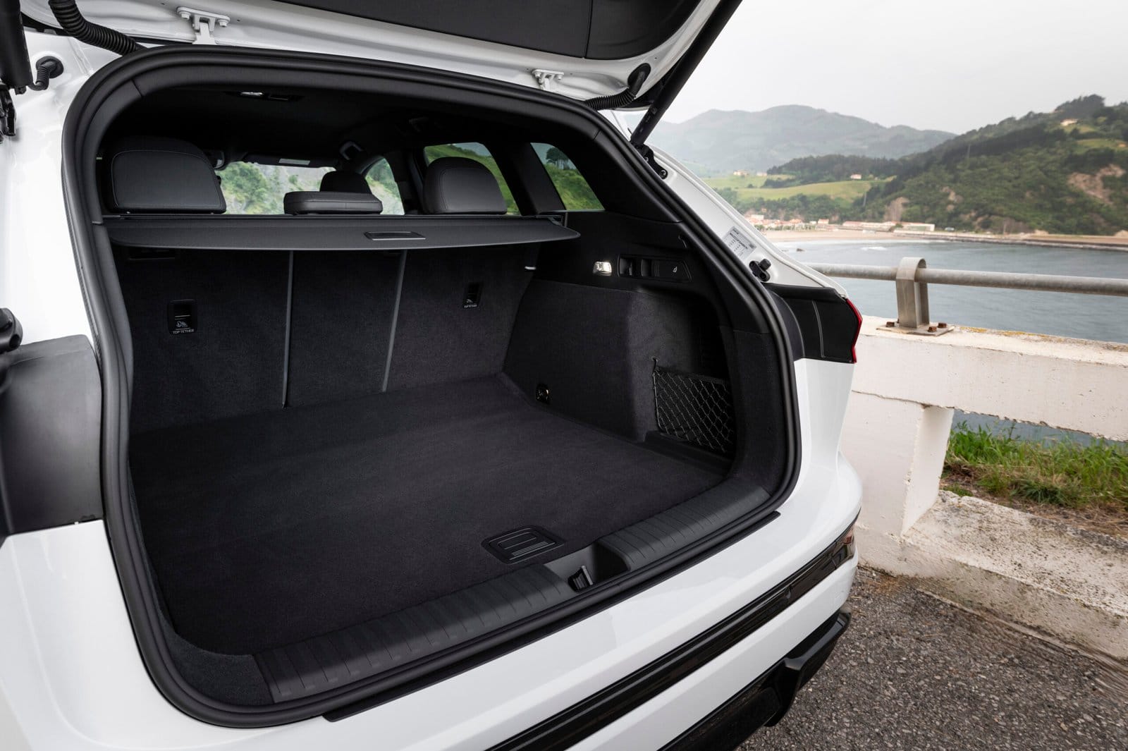 Open trunk view of Audi Q6 electric vehicle showing rear cargo space