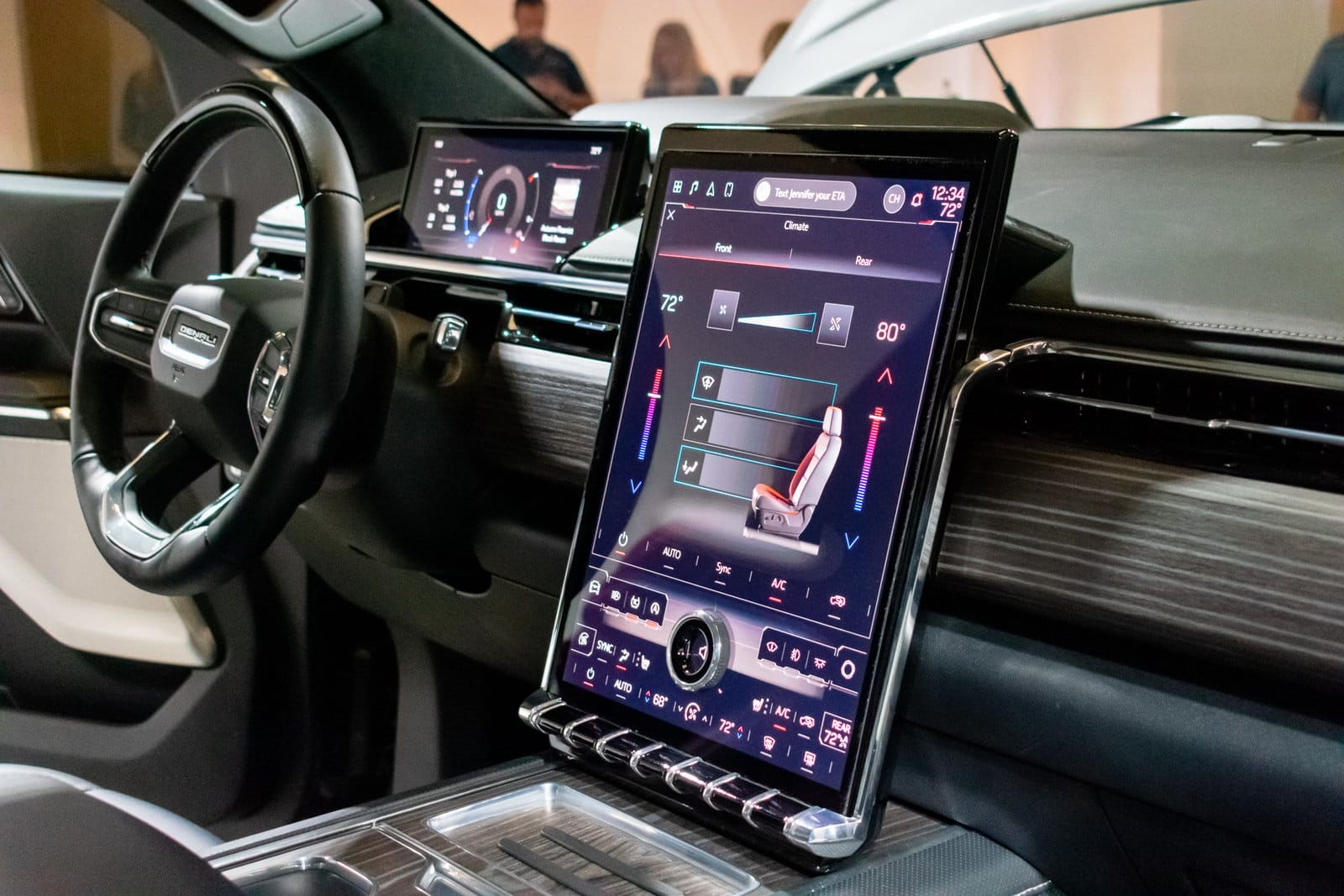 Digital infotainment and climate control screen inside GMC Sierra EV electric vehicle