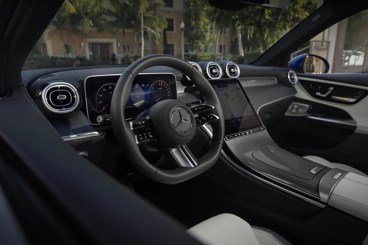 Steering wheel and dashboard of the Mercedes-Benz GLC PHEV electric vehicle showcasing the digital driver display and infotainment screen