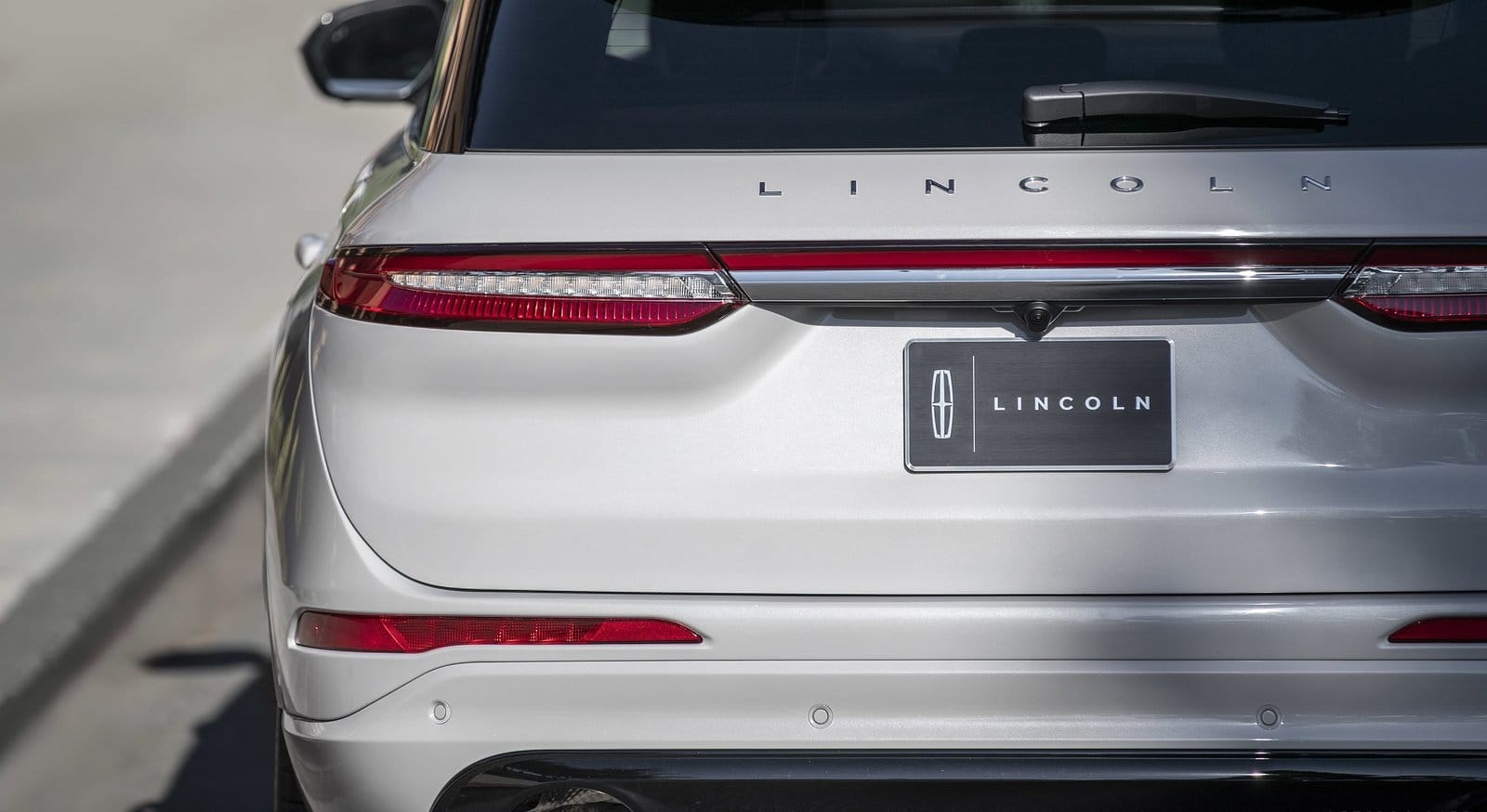Close-up of 2023 Lincoln Corsair electric vehicle rear with badge and tail lights