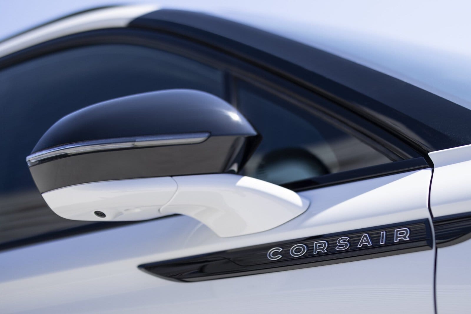 Close-up of side mirror and badging on Lincoln Corsair Grand Touring plug-in hybrid