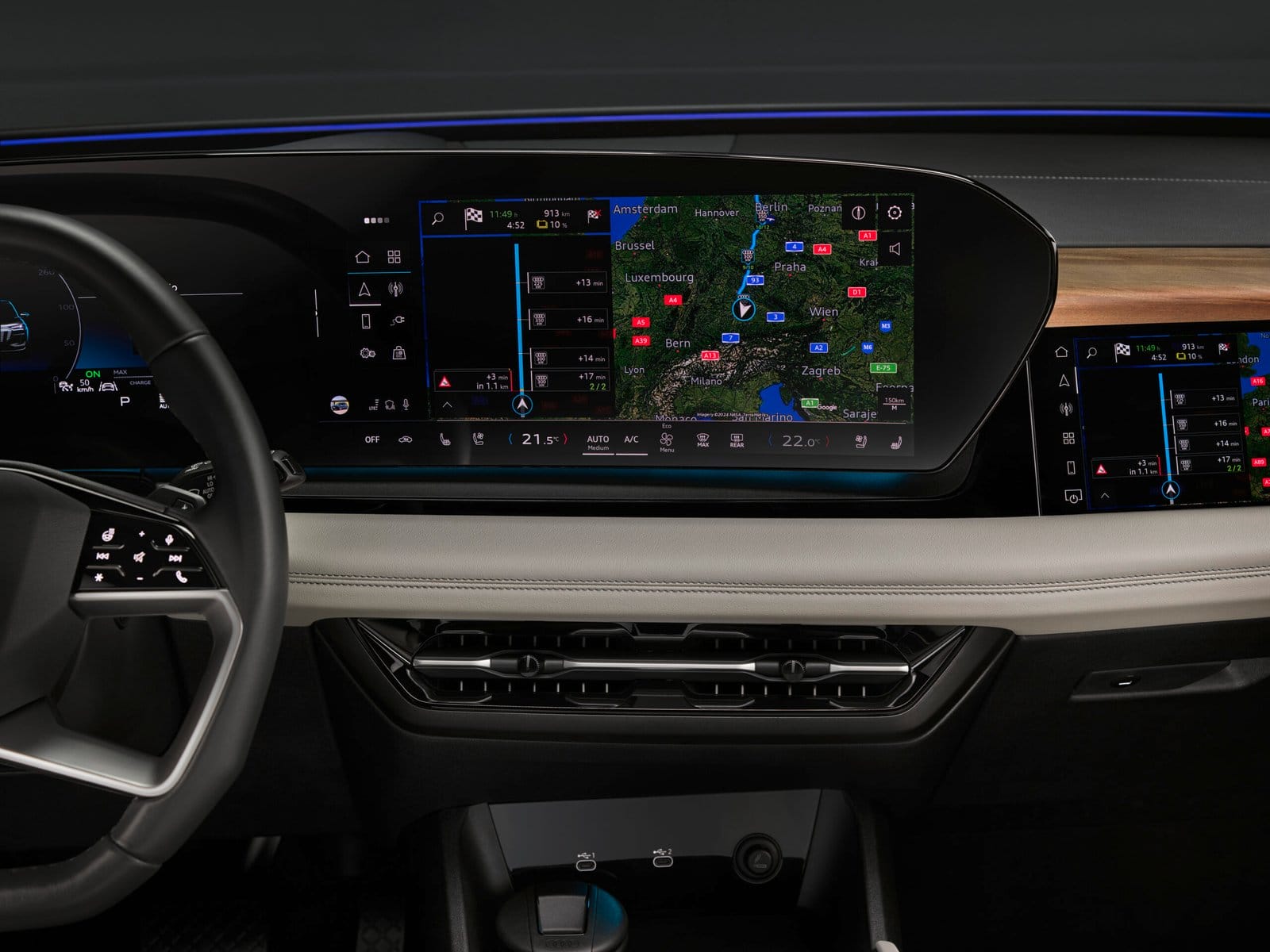 Close-up of Audi S6 e-tron electric vehicle digital dashboard showing navigation map and driving information.
