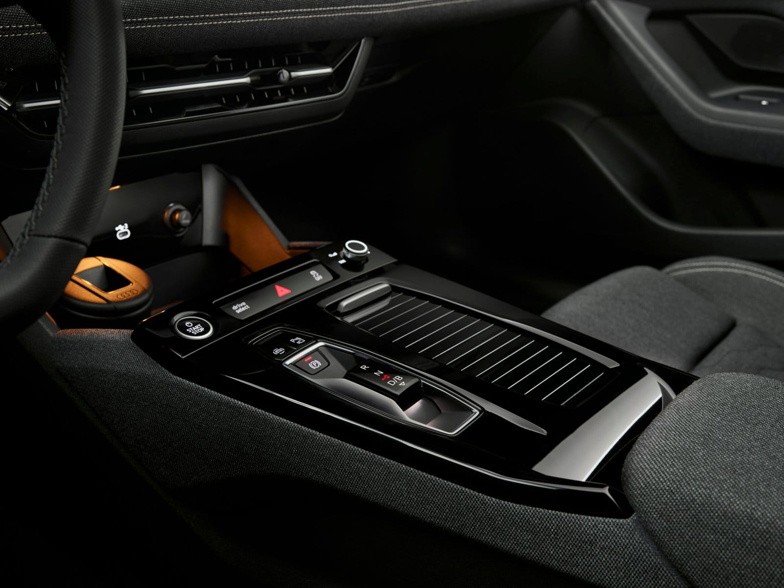 Close-up of the 2025 Audi A6 e-tron electric vehicle center console with gear selector and controls