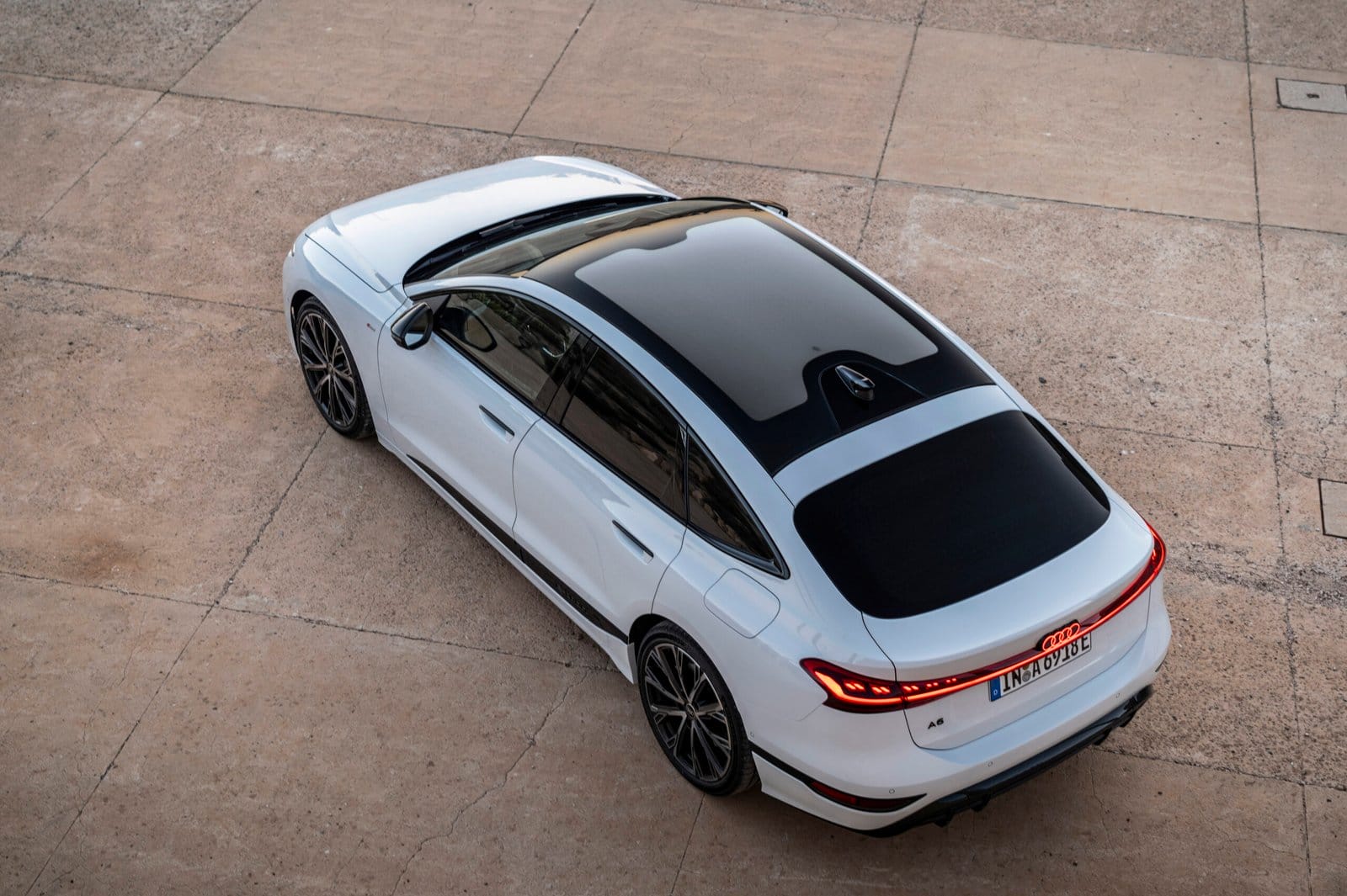 Top-down view of Audi A6 e-tron electric vehicle showing panoramic glass roof