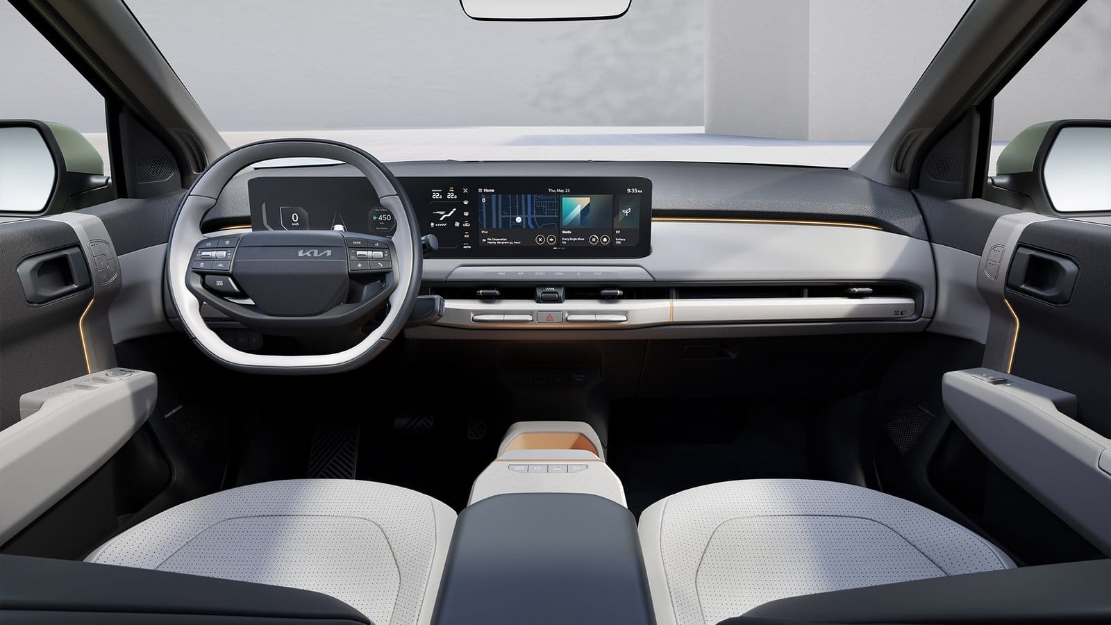 Front cabin of Kia EV3 electric vehicle with steering wheel, infotainment screen, and modern dashboard layout